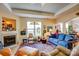 Comfortable living room featuring a fireplace, plush seating, and plenty of space at 2316 Winding River Dr, Charlotte, NC 28214