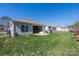 Backyard with a well maintained lawn, a patio and privacy fence at 2455 Seagull Dr # 62, Denver, NC 28037