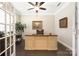 Home office with hardwood floors, a large desk, and natural lighting at 2455 Seagull Dr # 62, Denver, NC 28037
