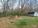 Backyard featuring a shed and fire pit at 2602 Cherokee Ct, Gastonia, NC 28056