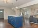 Spacious kitchen island with barstool seating and cabinet space offers a functional centerpiece for meal prep and gathering at 2602 Cherokee Ct, Gastonia, NC 28056