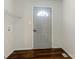 Mud room with wood floors and gray walls at 2602 Cherokee Ct, Gastonia, NC 28056