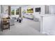 Bright living room featuring modern furniture, neutral color scheme, and a large window at 2640 Tillman N St, Monroe, NC 28112