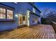 Outdoor deck off the back of the home with access from a door, plus surrounding trees at 2835 Peverell Ln, Charlotte, NC 28270