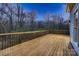 The deck has beautiful wood and is spacious with a view of the trees in the back at 2835 Peverell Ln, Charlotte, NC 28270