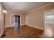 Office features hardwood floors, lots of natural light, French doors, and built-in shelving at 2835 Peverell Ln, Charlotte, NC 28270