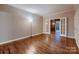 Office features hardwood floors, lots of natural light, French doors, and built-in shelving at 2835 Peverell Ln, Charlotte, NC 28270