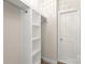 Closet features built-in shelving and a clothing rod, providing organized storage solutions at 3017 Woodlands Creek Dr, Monroe, NC 28110