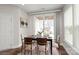 Bright dining room featuring a sliding glass door to outdoor patio area at 3017 Woodlands Creek Dr, Monroe, NC 28110