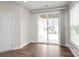 Bright living room featuring a sliding glass door to outdoor patio area at 3017 Woodlands Creek Dr, Monroe, NC 28110