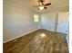 A brightly lit bedroom is furnished with plank floors and neutral walls at 3807 Woodlawn St, Sharon, SC 29742