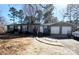 Charming single-story home featuring a two-car garage and inviting front porch with a stone walkway at 3807 Woodlawn St, Sharon, SC 29742