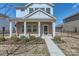 Welcoming two-story home with a covered front porch and neatly landscaped garden at 428 Nixon Rd, Belmont, NC 28012