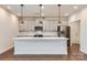 Bright modern kitchen showcasing an island with pendant lighting and stainless steel appliances at 428 Nixon Rd, Belmont, NC 28012