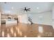 Bright and airy open living space with hardwood floors, flowing into the modern kitchen at 428 Nixon Rd, Belmont, NC 28012