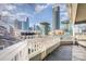 Balcony featuring Charlotte skyline view with railing offering an exceptional urban living experience at 433 W 8Th St, Charlotte, NC 28202