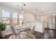Eat-in kitchen features stainless steel appliances, natural light, and seating for four at 433 W 8Th St, Charlotte, NC 28202