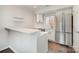 Modern kitchen featuring white cabinets, quartz countertops, and stainless steel refrigerator at 433 W 8Th St, Charlotte, NC 28202