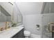Charming bathroom featuring a vanity with gold hardware and a glass-enclosed shower at 4335 Piper Glen Dr, Charlotte, NC 28277