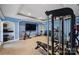 Home gym with exercise equipment and plenty of space for workouts at 4335 Piper Glen Dr, Charlotte, NC 28277