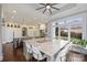Bright kitchen with a large island, breakfast bar, natural light, and modern finishes at 4335 Piper Glen Dr, Charlotte, NC 28277