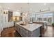 Gourmet kitchen with a large center island, stainless steel appliances, and custom cabinetry at 4335 Piper Glen Dr, Charlotte, NC 28277