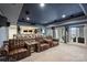 Spacious home theater with tiered seating and ample seating at 4335 Piper Glen Dr, Charlotte, NC 28277