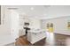 Modern kitchen with an island, stainless steel appliances, and a sliding glass door to the backyard at 469 Court House Ave, York, SC 29745