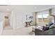 Bright living room offers comfortable seating, modern decor, and a view of the outdoors at 469 Court House Ave, York, SC 29745