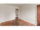 Bedroom with wood floors, window, and overhead lighting at 4914 Ridgeley Dr, Charlotte, NC 28208