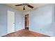 Bedroom with hardwood floors and a door at 4914 Ridgeley Dr, Charlotte, NC 28208