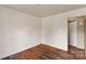 Bedroom with wood floors, window, and overhead lighting at 4914 Ridgeley Dr, Charlotte, NC 28208