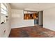 Living room with hardwood floors, window, and access to other rooms at 4914 Ridgeley Dr, Charlotte, NC 28208