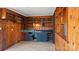 An open and airy room with wood paneled walls at 4914 Ridgeley Dr, Charlotte, NC 28208