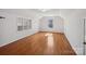 An empty bedroom with hardwood floors, a single window and built in shelving at 501 Colonels Ct, Clover, SC 29710