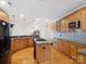 Kitchen with stainless steel appliances, granite counters, an island, and wood cabinets at 501 Colonels Ct, Clover, SC 29710