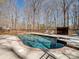 A large swimming pool with a brick border and lounge chairs surrounding the area at 501 Colonels Ct, Clover, SC 29710