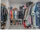 Walk-in closet with ample storage, including shelves, rods, and shoe racks, providing an organized space at 5056 Blue Serenity Ct, Denver, NC 28037