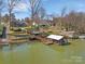 Scenic lakefront property featuring multiple docks and landscaped yards at 5064 Lynwood Rd, Sherrills Ford, NC 28673