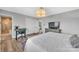This bedroom has an office setup and an en suite bathroom featuring a walk-in shower at 5064 Lynwood Rd, Sherrills Ford, NC 28673