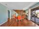 The dining room features a table with orange chairs near a sliding door to the outside at 5064 Lynwood Rd, Sherrills Ford, NC 28673