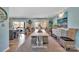 Elegant dining room with a long wooden table, wicker chairs, and views of the outdoor deck at 5064 Lynwood Rd, Sherrills Ford, NC 28673