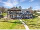 Two-story home with decks, landscaped yard and inviting walkway at 5064 Lynwood Rd, Sherrills Ford, NC 28673