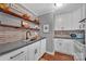 Functional kitchen featuring open shelving, modern appliances and a neutral color scheme at 5064 Lynwood Rd, Sherrills Ford, NC 28673