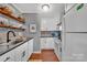 Bright, well-appointed kitchen with white cabinets and modern appliances at 5064 Lynwood Rd, Sherrills Ford, NC 28673