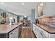Open kitchen flowing into dining area features modern appliances and stylish decor, perfect for Gathering gatherings at 5064 Lynwood Rd, Sherrills Ford, NC 28673