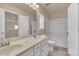 Bright bathroom featuring a double sink vanity, tub, toilet, and tile floors at 530 Silers Bald Dr, Fort Mill, SC 29715
