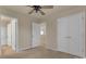 Bedroom featuring a ceiling fan, carpet, and multiple closets at 530 Silers Bald Dr, Fort Mill, SC 29715