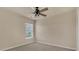 Bedroom with a ceiling fan, carpet, and a large window at 530 Silers Bald Dr, Fort Mill, SC 29715