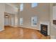 Bright living room with fireplace and hardwood floors at 530 Silers Bald Dr, Fort Mill, SC 29715